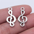Treble Clef Metal Charm Pendant in Two Vintage Finishes view 1
