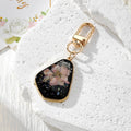 Black Resin Pressed Flower Keychains in Six Designs view 2