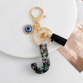 Shell-Chip Resin Letter Keychain with Evil Eye Charm and Tassel view 12