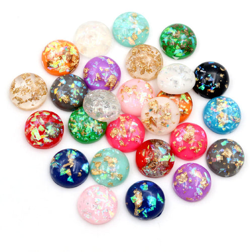 Round cabochons arranged assortment on a white background