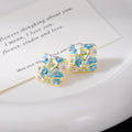 Pink and Blue Floral Pattern Square Gold Tone Stud Earrings view 3