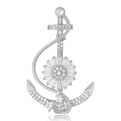 Gold Anchor, Silver Anchor brooch styles arranged on a light display