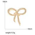 Textured Outline Bow Brooch in Gold and Silver Tones view 5