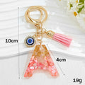 Resin Initial Letter Keychain with Evil Eye and Pink Tassel view 3