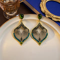 Gold Leaf Filigree Drop Earrings Green Teal Crystals view 1