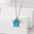 Gold Tone Blue Opal Effect Animal and Butterfly Pendant Necklaces view 8