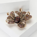 Iris Flower Brooch in Metal with Crystal Petals and a Faceted Center view 3