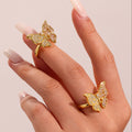Gold Copper Open Butterfly Ring Pave and Baguette Zircon view 3