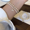 Three Mixed Pearl Like Bracelets With Tail Cluster Or Oval Center view 3