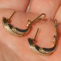 Gold Tone Twisted Baguette Stone Huggie Hoop Earrings view 3