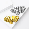Folded Ribbon Brooch In Sculptural Silver And Gold Tones view 4