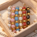 Winged Cross Bead Stretch Bracelets Six Colors Gold Spacers view 4