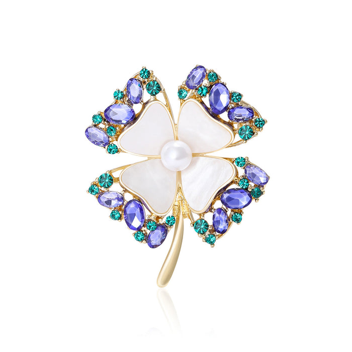 Four-Leaf Crystal And White Petal Brooch In Two Tones