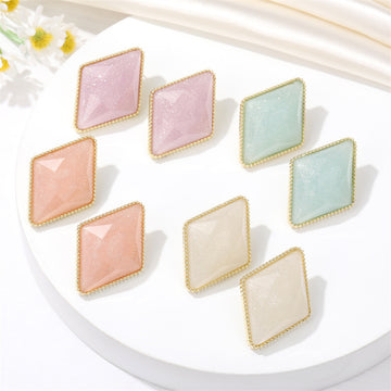 Faceted Diamond Shape Stud Earrings with Gold Tone Edges in Four Colors