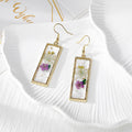 Gold Tone Slim Rectangular Pressed Flower Drop Earrings in Four Designs view 3