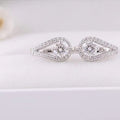 Silver Tone Teardrop Huggie Earrings With Clear Stones view 4