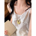 Oval Pendant Cord Necklace In Four Pastel Colors With White Frame view 4