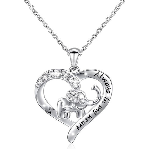 Front product view of silver tone heart elephant pendant necklace with clear stones