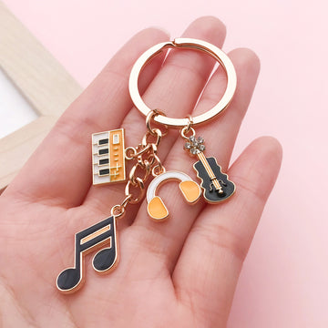 Guitar, Piano and Music Note Charm Keychains in 25 Pictured Variations for Bags and Keys