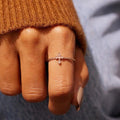 Tiny Cross Clear Stone Ring In Three Polished Metal Tones view 3