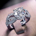 Silver Tone Round CZ Four Prong Twisted Pave Finger Ring view 1