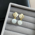 White Round Drop Crystal Look Shell Top Dangle Earrings view 4