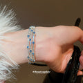 Silver Triple Row Open Cuff Bangle Blue Clear Stones view 1