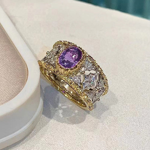 Two-tone purple oval center wide ring product close-up