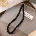 Black Pearl Look Round Bead Strand Necklace in Two Sizes view 2