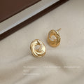 Gold Twisted Swirl Stud Earrings Crystal Arc Open Center view 4