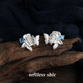 Silver Tone Sculpted Rose Butterfly And Blue Stone Stud Earrings view 4
