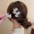 Pink Rhinestone Star and Dog Bow Duckbill Hair Clips view 2