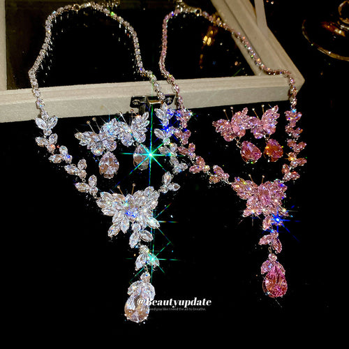 butterfly crystal tassel necklace and earring set in pink or clear shown in the first close product view