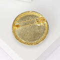 Round Crackle Stone Brooch With A Round Veined Cabochon Bordered By Small Amber Crystals view 3