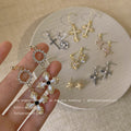 Gold-Tone Pavé Cross Stud And Pearl Cross Drop Earrings view 3