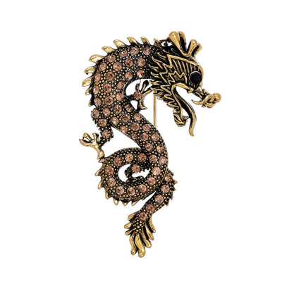 Front product view of the dragon brooch pin in gold and black