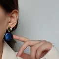 Gold Tone Round Top Dark Blue Sculpted Drop Stud Earrings view 2