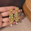 Gold Tone Sun Filigree Teardrop Pearl Look Dangle Earrings view 4