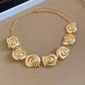 Gold Spiral Shell Necklace Bracelet Earrings and Ring view 6
