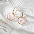 Gold Tone Moon and Butterfly Pressed Flower Huggie Earrings in Eight Designs view 3