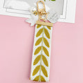 Embroidered Leaf Ribbon Wristlet Keychain With Pearl Bead Strap And Charm view 10