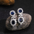 Royal Blue Floral CZ Drop Earrings Silver Tone Halo view 1