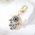 Gold and Silver Tone Enamel Hamsa Hand Evil Eye Clip Keychains in Four Designs view 5