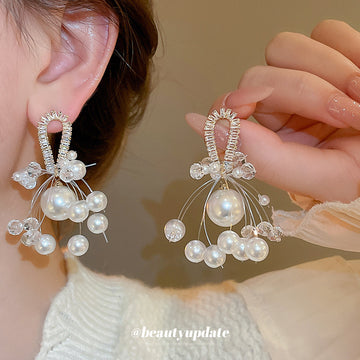 Gold Tone Bow Earrings With White Pearl And Crystal Clusters