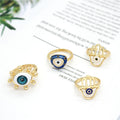 Gold Tone Adjustable Evil Eye and Hamsa Rings in Four Designs view 1