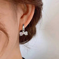 Heart Bow Crystal Huggie Hoop Earrings Gold Silver Clear Pink view 3