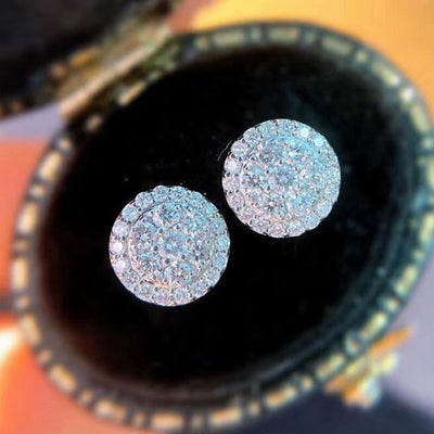 Pair of round full pave clear CZ studs in open jewelry box