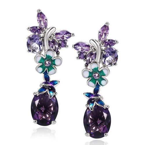 Close front view of purple crystal flower drop earrings