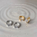Gold Tone Mini Huggie Hoop Earrings Baguette Zircon Accent view 1