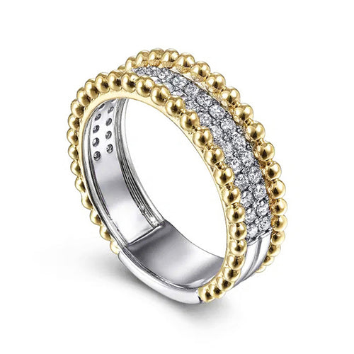 Angled side view showing gold bead edges and silver inner face